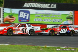 Former Series Champion Donald Theetge (80QC) and Jonathan Bouvrette (41QC) battle for position at Autodrome St Eustache in 2012. Serie ACT will kick off the 2013 season this Saturday, June 1 at Autodrome St Eustache for the first time since 2010. (Photo Credit: Andy Allaire)