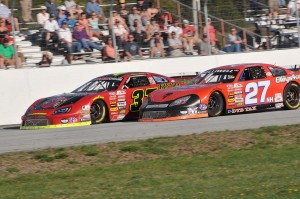 Defending ACT Champion Wayne Helliwell, Jr.(27NH) fights for the victory with eight-time ACT Champion Brian Hoar (37VT) at Devil's Bowl Speedway this past Sunday, May 5 at the Spring Green 113. Helliwell earned the victory by .027 of a second. (Photo Credit: Eric LaFleche)