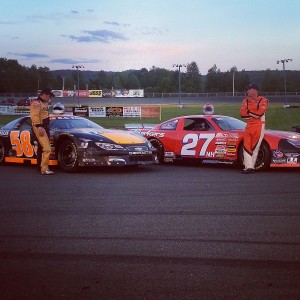 Reigning ACT Champion Wayne Helliwell, Jr. (27NH) and sophomore talent Jimmy Hebert (58VT) talk before the start of the ACT 150 at Canaan Fair Speedway last Saturday, June 15.  Helliwell has taken over the point lead, with Hebert just behind him in second place.  (Photo Credit: ACT)