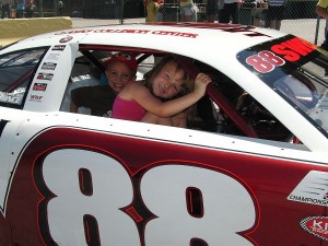 Children at Thunder Road prepare for a race car ride around the track in 2012.  Kids Night returns to Thunder Road this Sunday, June 16 complete with free admission, a free hot dog, and race car rides for children 12 and under.  (Photo Credit: David Heath)