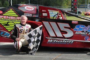 Kenny Tremont, Jr., celebrates his Subway Fresh Fit 50 victory in the Northern Modified Challenge Series event at Canaan Fair Speedway.