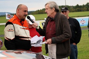 Devil's Bowl Speedway Late Model champion Chris Bergeron (left), shown in victory lane with legendary broadcaster Ken Squier, will try to become the first-ever repeat champion in his division in 2014.