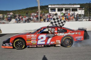 Wayne Helliwell, Jr. celebrates his 2013 ACT Spring Green win at Devil’s Bowl Speedway. (Photo by Eric LaFleche)