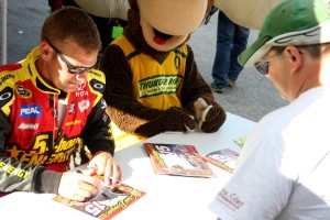 NASCAR Star Clint Bowyer signs autographs for fans at last year’s VT Governor’s Cup 150 at Thunder Road. (Photo by Alan Ward).